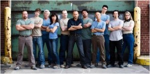 Host Daniel Fathers (centre) puts 10 self-proclaimed know-it-alls to the ultimate test in Canada's Greatest Know-It-All, premiering Jan. 30 on Discovery Channel 